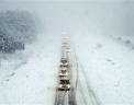 Автомобили едут сквозь весеннюю бурю, штат Мэн. Фото: AP