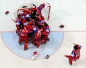 Хоккеисты сборной России радуются победе в финальном матче чемпионата мира по хоккею 2012 между сборными командами России и Словакии. Фото: РИА Новости