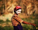 Мусульманка рохинья в лагере для людей, которые пострадали от насилия, Мьянма. На лице у женщины традиционная паста «Thanaka» из измельченных корений и коры дерева, которая защищает от солнечных ожогов. Фото: Reuters