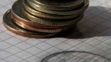 Монеты достоинством 1, 2 и 5 рублей. Фото: Наталья Гребенюк/BFM.ru